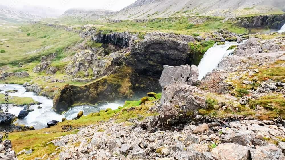 Dynjandi waterfall located in Arnarfjordur, Iceland. It is the largest waterfall in the Westfjords Dynjandi waterfall located in Arnarfjordur, Iceland. It is the largest waterfall in the Westfjords