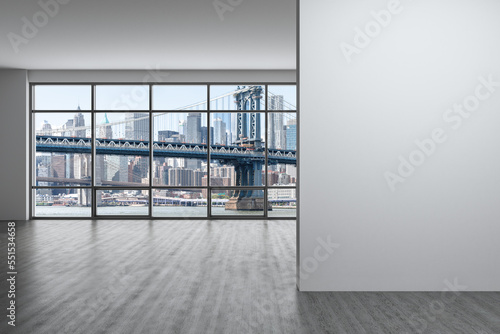 Downtown New York City Lower Manhattan Skyline Buildings. High Floor Window. White mockup wall. Empty room Interior Skyscrapers View Cityscape. Financial district. Brooklyn Bridge. 3d rendering.