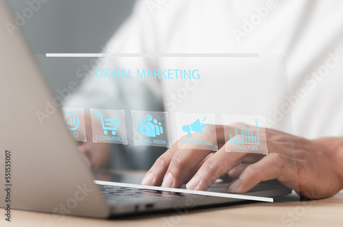 Businessman working with laptop with digital marketing icons on virtual screen. Digital marketing internet advertising and sales increase. business technology concept.
