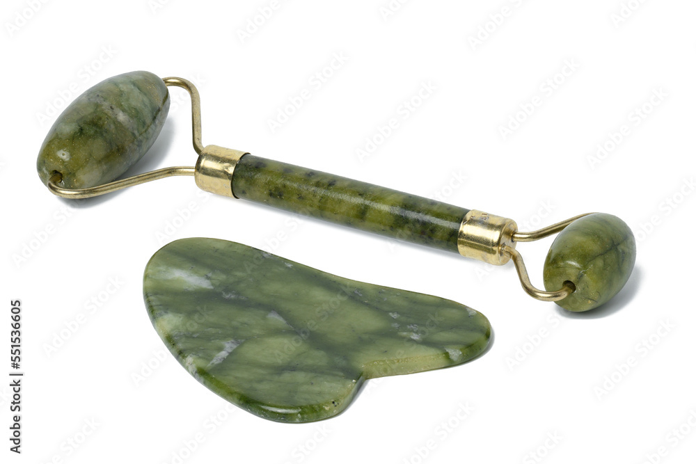 Jade facial massager, an item for cosmetic procedures on a white isolated background