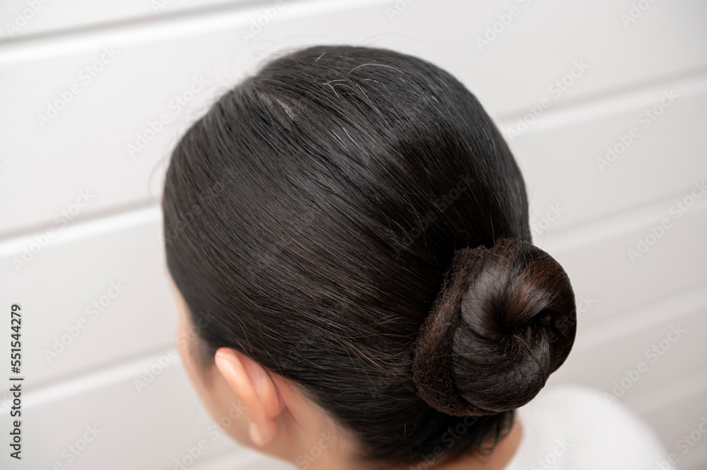 Fototapeta premium Close-up hoary hair on woman head , health care concept