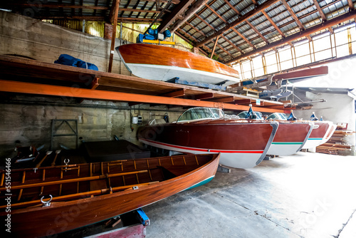 Vinage wooden motor boats in shipyard