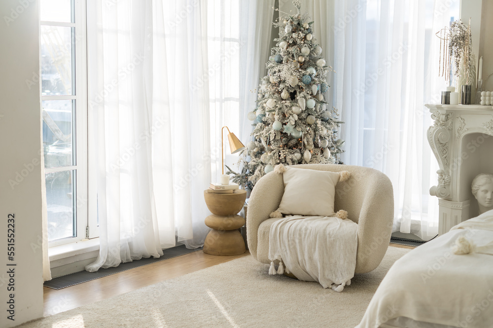 Fototapeta premium Living room in Scandinavian style with a Christmas decor. Holiday background. New Year