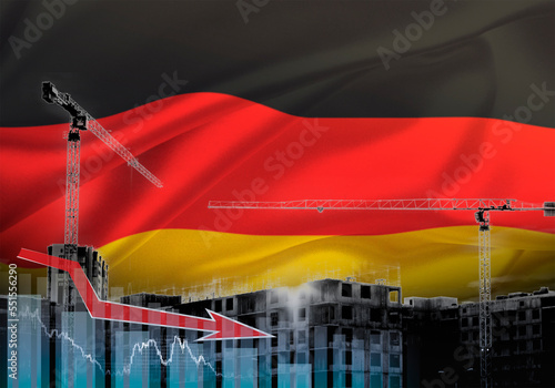 Construction cranes on the background of the flag of Germany. The concept of a crisis in construction.