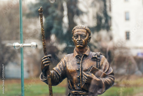 POLTAVA, UKRAINE - DECEMBER 3, 2022: Bronze sculpture of Ukrainian philosopher and poet Hryhorii Skovoroda during the day