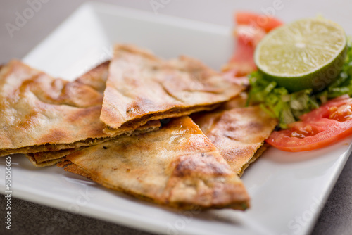 arais shawarma wrap snack with lime and salad served in dish isolated on grey background top view of arabic food