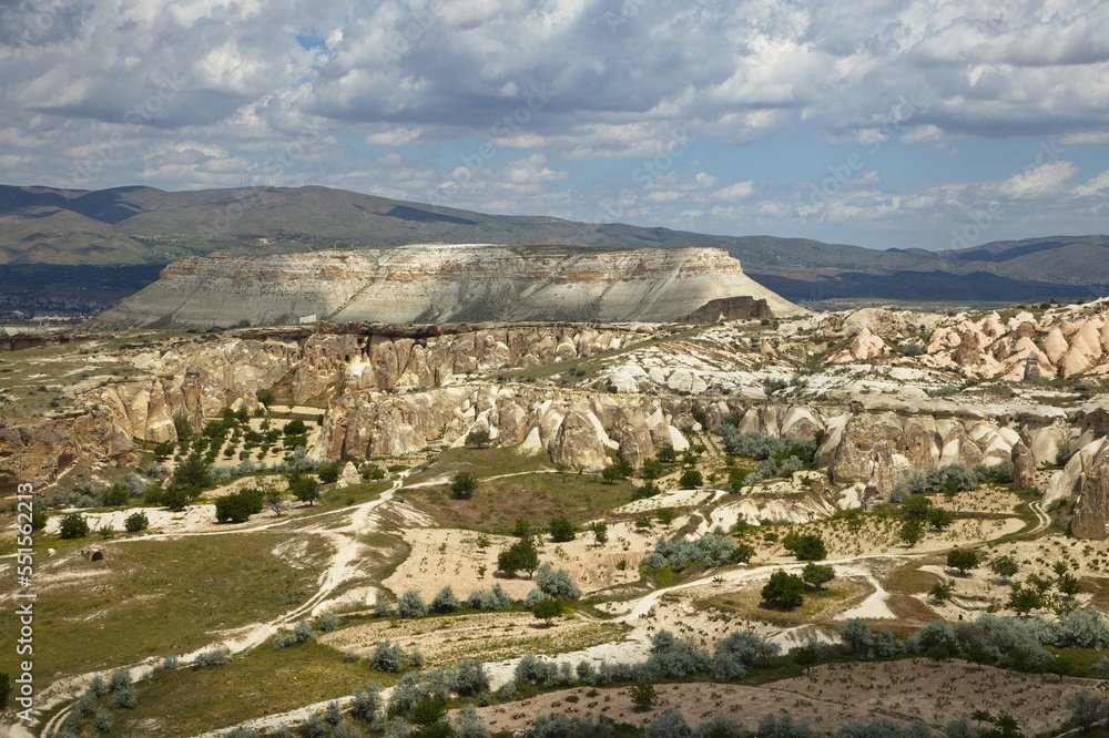 View of the landscape at Cavusin from the rock ridge in Cappadocia,Nevsehir Province,Turkey
