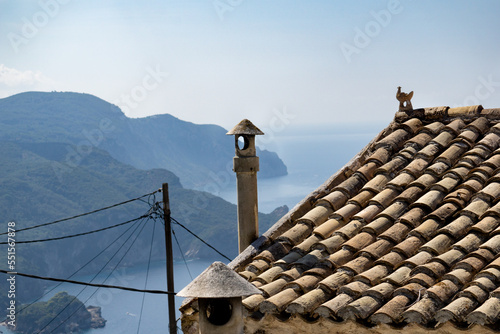 mediterran roof in front of the mountainous coast of corfu