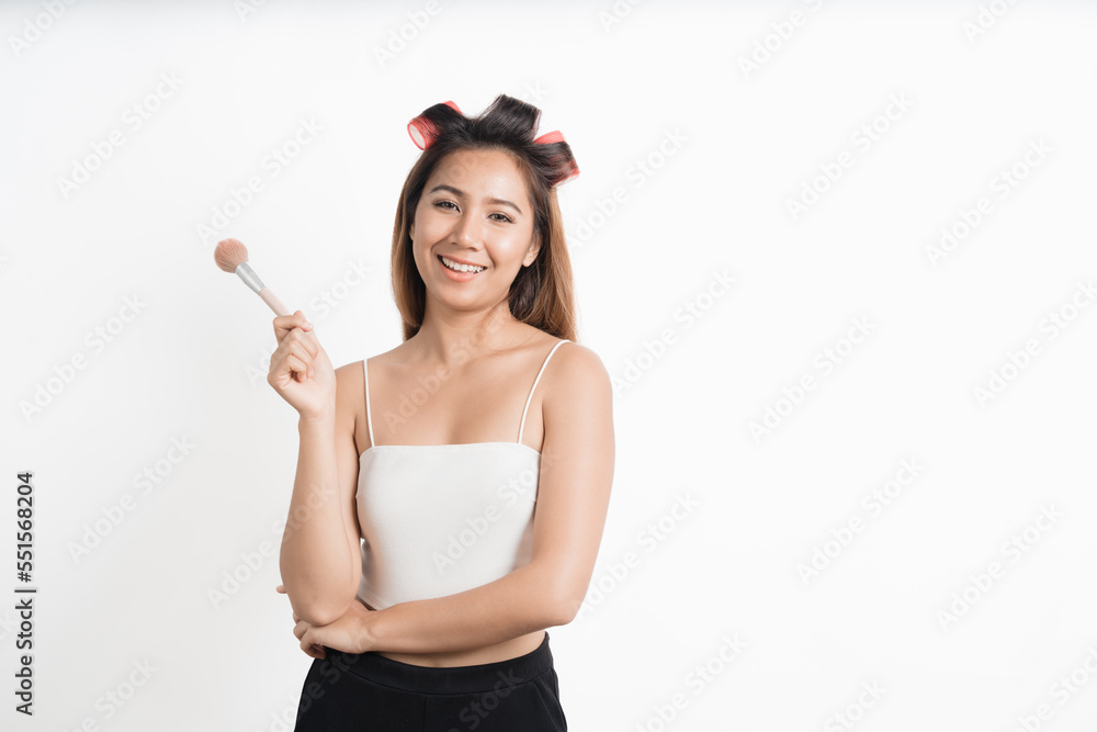 Beauty asian woman applying makeup with brush of cheek isolated on white background. Beauty asian woman applying makeup with brush of cheek isolated on white background.