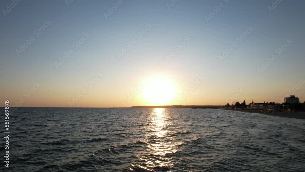 copter 4k cool drone flight along the coast near the sea at sunset