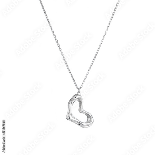 Silver pendant on a chain isolated on white background Silver neclace and pendant in the shape of hear