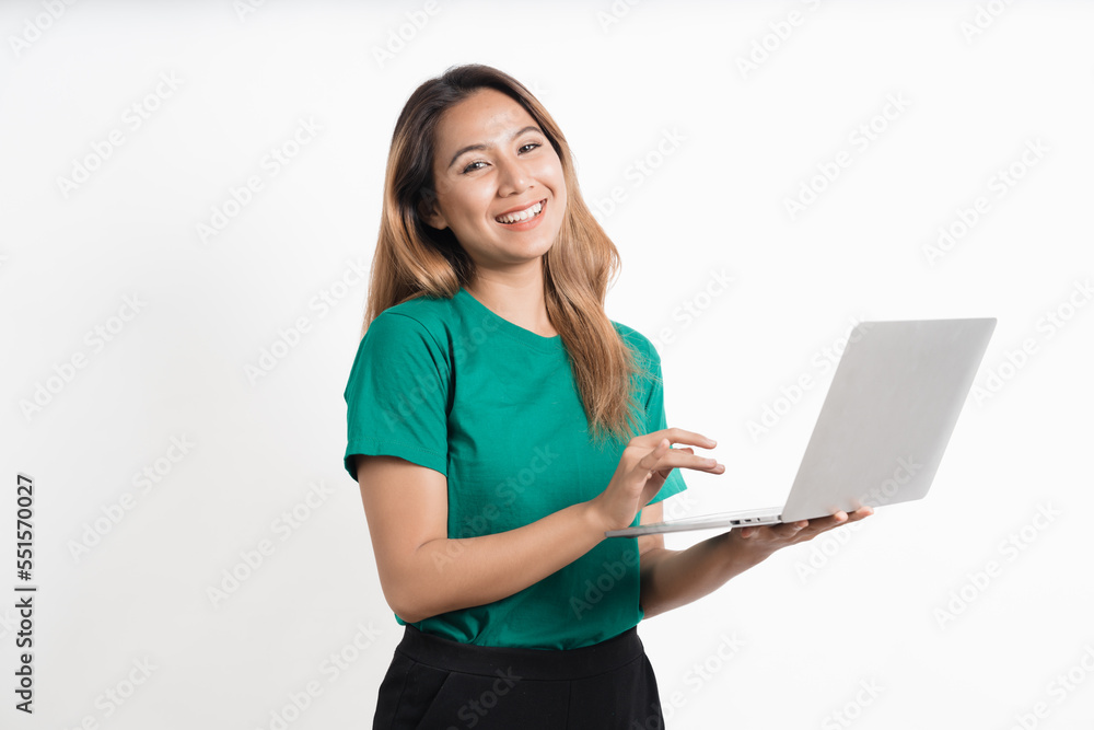 Portrait of happy young asian girl using laptop computer isolated over white background. Portrait of happy young asian girl using laptop computer isolated over white background.