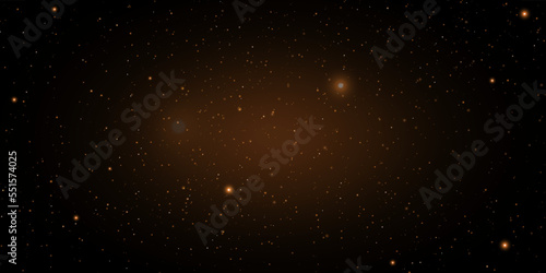 Abstract background of flickering gold particles and light flare.
