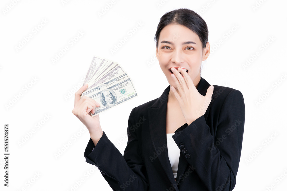 Excited Business asian woman wearing office cloth successful holding US dollars money in hand feeling happy and surprise Bankruptcy Economic Financial Concept money bills celebration isolated on white Excited Business asian woman wearing office cloth successful holding US dollars money in hand feeling happy and surprise Bankruptcy Economic Financial Concept money bills celebration isolated on white