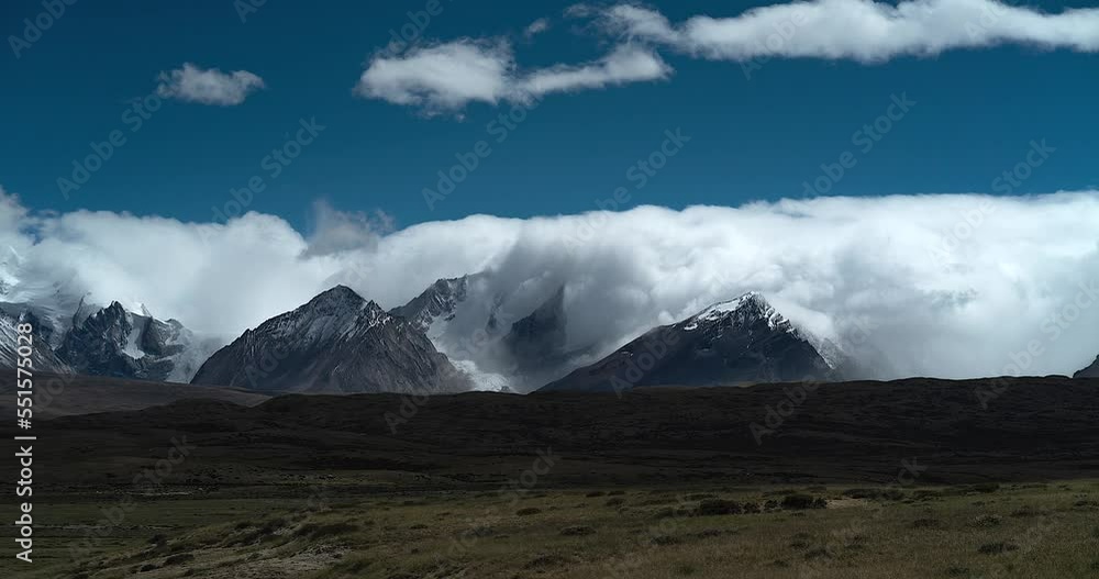 Clouds climb over the Himalayas, Tibet, China. Clouds climb over the Himalayas, Tibet, China.