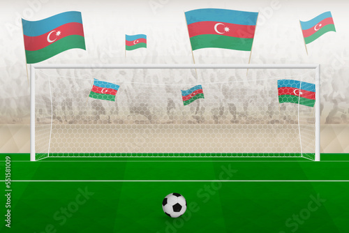 Azerbaijan football team fans with flags of Azerbaijan cheering on stadium, penalty kick concept in a soccer match.