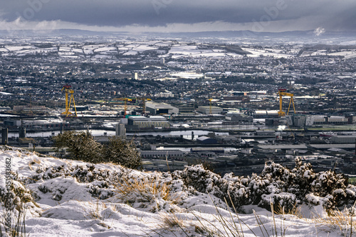 Samson and Goliath twin shipbuilding cranes at Queen's Island, Belfast, Northern Ireland. View form Cave Hill mountain in the snow.