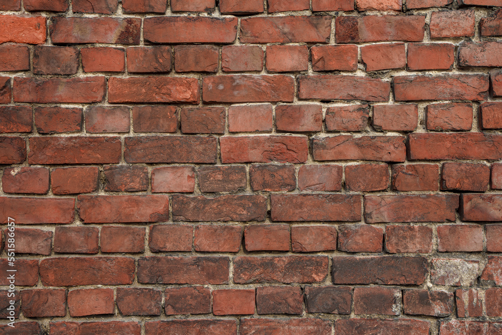 Red brick wall background close up