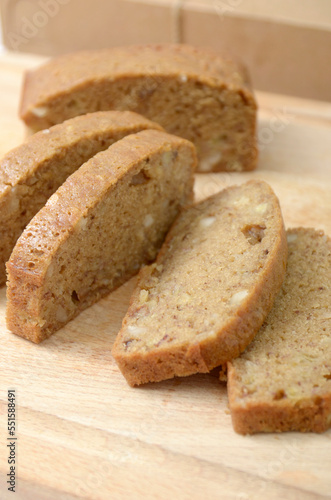 sliced banana Cake on a wooden board