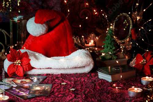 Concept of Christmas divination predictions on tarot cards and other magic photo