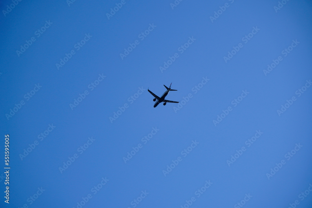 airplane in clear sky. travel with a plane in a minimalism photography airplane in clear sky. travel with a plane in a minimalism photography