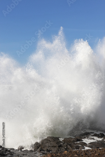 Huge waves slam against rocks during a king tide in Yachats  Oregon.