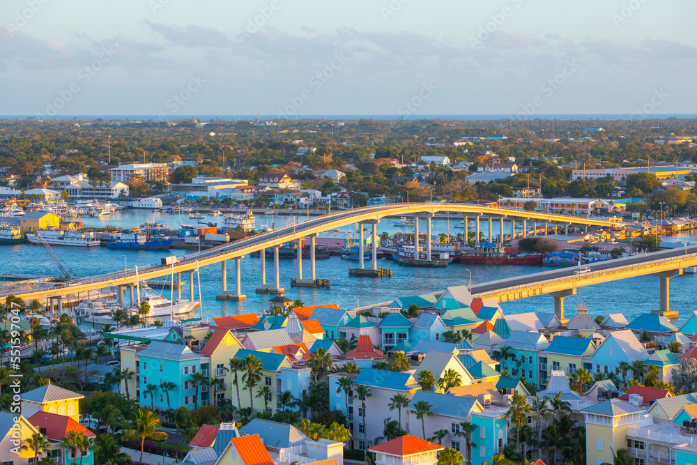 Nassau downtown aerial view including Paradise Island Bridge and Potters Cay in Nassau Harbour, New Providence Island, Bahamas. 