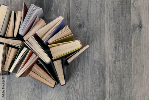 Top view of many books. Culture, reading, library, information and editorial concept. Background.