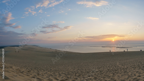 Sunset with view at the sea on a huge natural sand formation on the Dune du Pilat  Arcachon  Nouvelle-Aquitaine  France