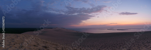 Panorama of twilight after sunset with view at the sea on a huge natural sand formation on the Dune du Pilat  Arcachon  Nouvelle-Aquitaine  France