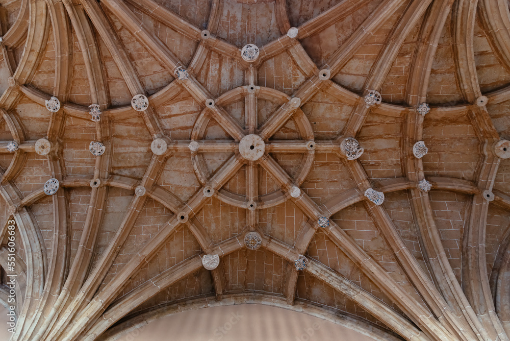 Directly below view of stone ribbed vault in Renaissance Style monument, Salamanca, Spain