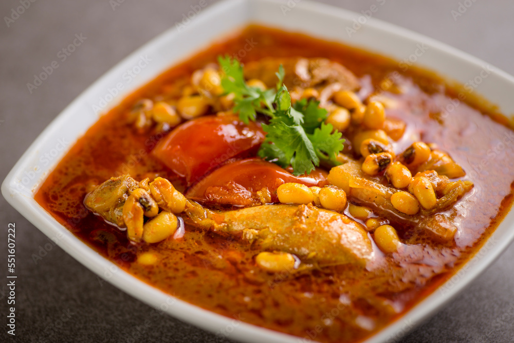 khoresh chicken served in dish isolated on grey background top view of arabic food khoresh chicken served in dish isolated on grey background top view of arabic food