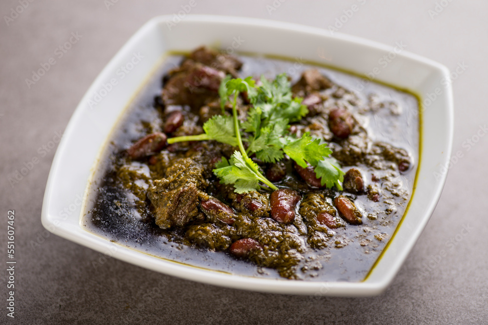 khoresh sabzi served in dish isolated on grey background top view of arabic food khoresh sabzi served in dish isolated on grey background top view of arabic food