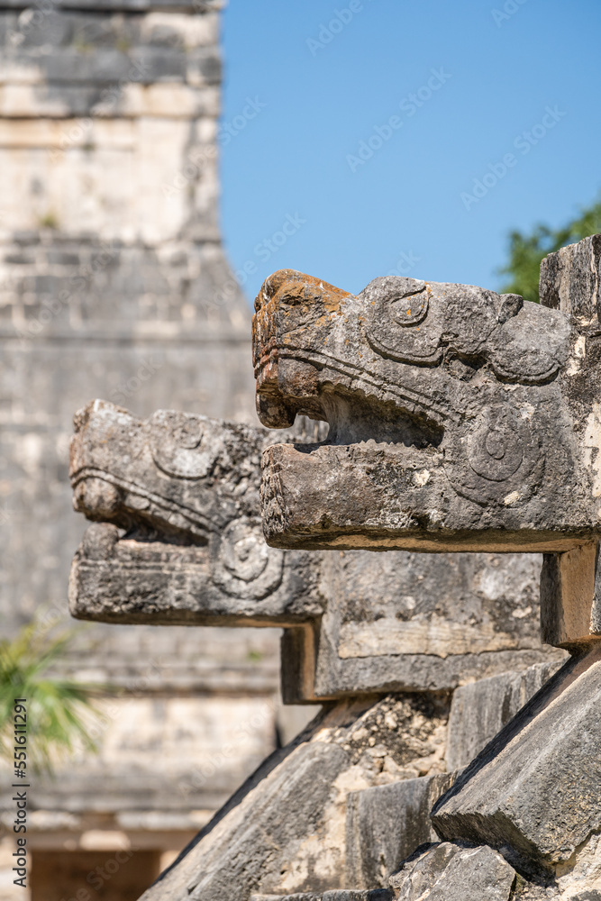 Large snake head sculptures at Chichen Itza Archaeological Zone.