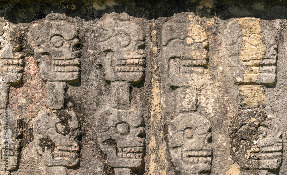 The Tzompantli of Chichen Itza ruins in Mexico. The wall of skulls.