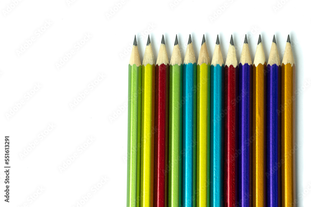 Colored pencils isolated on a white background, a place for information. Colored pencils isolated on a white background, a place for information.