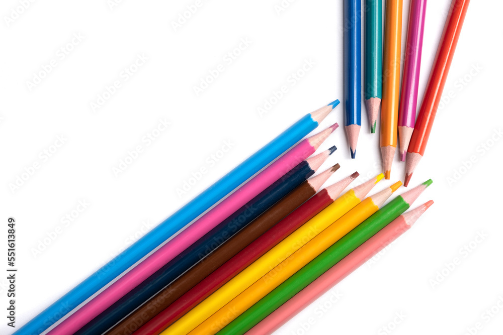 Colored pencils isolated on a white background, a place for advertising. Colored pencils isolated on a white background, a place for advertising.