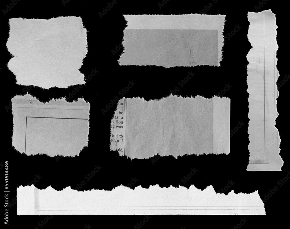 Torn papers on black