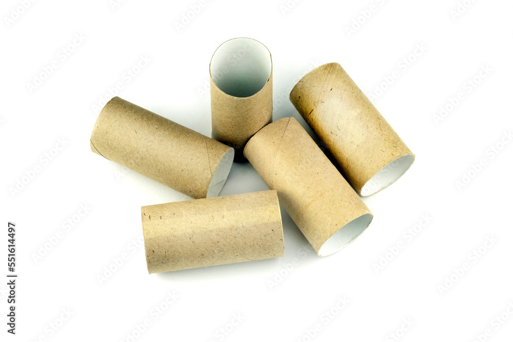 Empty toilet paper rolls. Paper waste for recycling. Cardboard core made of papyrus paper. Empty bath towels on a white background. Empty toilet paper rolls. Paper waste for recycling. Cardboard core made of papyrus paper. Empty bath towels on a white background.