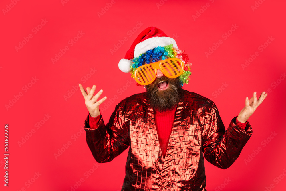 Sorry Santa, Naughty just feels Nice. Bearded man celebrate christmas. Christmas party entertainment. Christmas spirit. Cheerful clown colorful hairstyle. Funny man with beard. Winter holidays Sorry Santa, Naughty just feels Nice. Bearded man celebrate christmas. Christmas party entertainment. Christmas spirit. Cheerful clown colorful hairstyle. Funny man with beard. Winter holidays