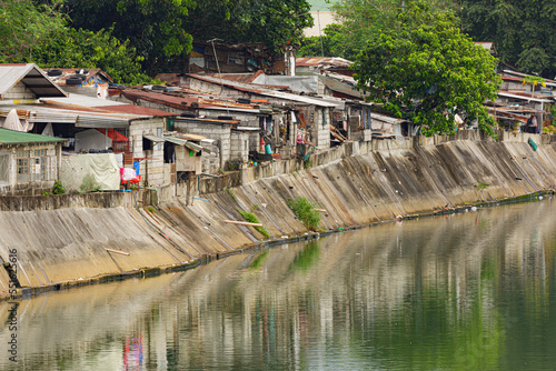 People living in poverty along the canals of Manila Philippines