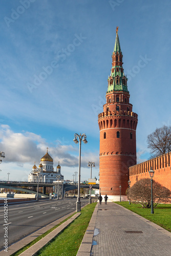 Vodovzvodnaya tower of the Moscow Kremlin with the Church of the Nativity in the background. Moscow, Russia. Architecture and sights of the Russian capital photo