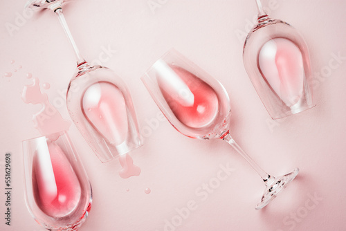 Rose wine on a pink background.