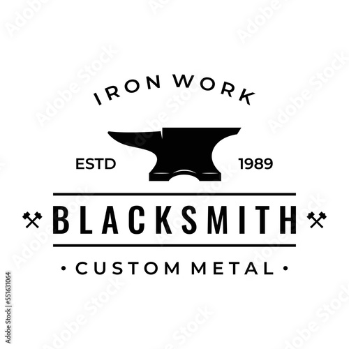 blacksmith anvil job logo vintage. With hammer and horseshoe isolated background.Logo for industry. workshop.