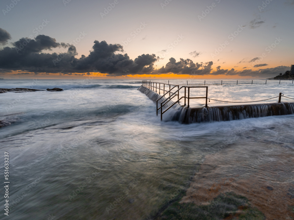 Cronulla rock pool overflowing in the high tide, Sydney, Australia. Stock Photo Adobe Stock