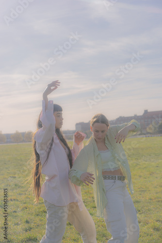 women in nature dancing photo