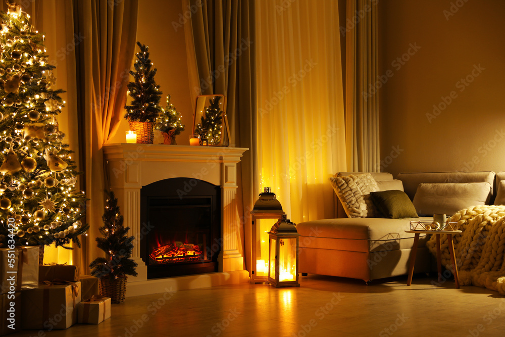 Fototapeta premium Stylish living room interior with beautiful fireplace, Christmas tree