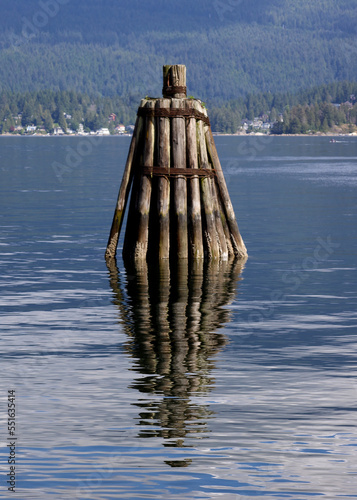 Wooden structure used for the mooring of barges photo