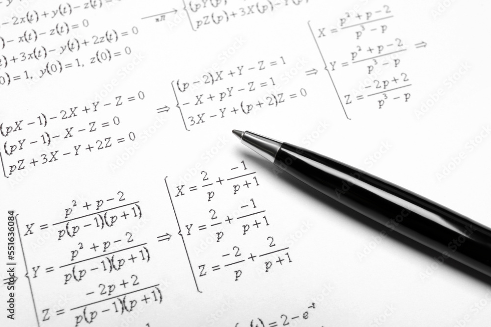 Sheet of paper with mathematical formulas and pen, closeup Sheet of paper with mathematical formulas and pen, closeup