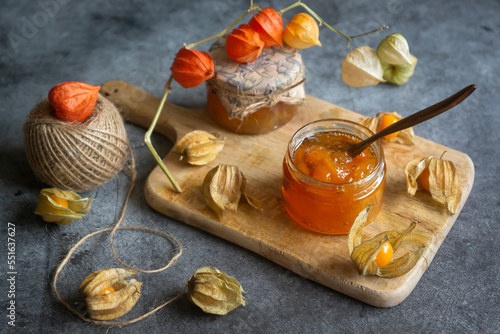 Tasty, fragrant jam and physalis fruits on the table.